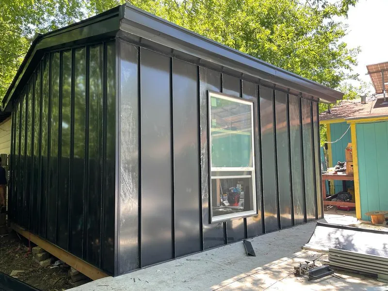 Black standing seam metal wall panels for Metal Roof Installation in Waterford